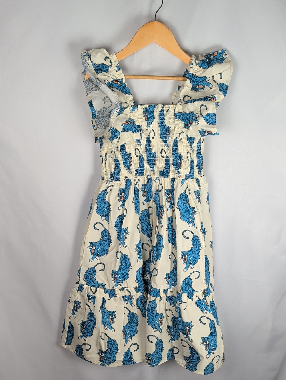 RYK Girls' Cream Sundress with Blue Tiger Print - Smocked Bodice 10 AU